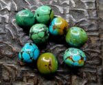 "High-quality loose natural Tibetan turquoise beads for jewelry making, showing authentic blue-green mineral hues and dark matrix."