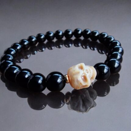 Natural agate beads bracelet with a hand-carved pearl skull.