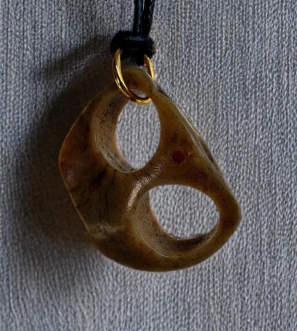 Antique Tibetan Kapala ritual bone amulet front view