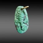 Tibetan turquoise scorpion hand-carved antique amulet with visible dark matrix and metal ring.