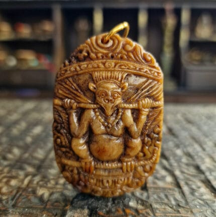 Tibetan antique kapala amulet garuda front view